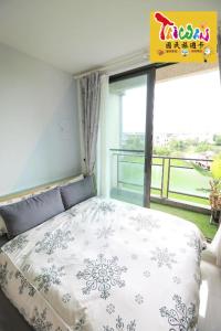 Letto o letti in una camera di 充電樁 羅東雲朵朵Cloud B&B免費洗衣機 烘衣機 近週三清溝 星巴克咖啡豆 國旅卡特約店