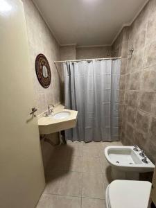 Ванная комната в Dpto 11-UNNE