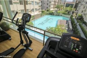 The fitness centre and/or fitness facilities at Affordable Staycation-2-BR Free Wifi