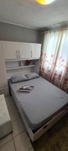 Ένα ή περισσότερα κρεβάτια σε δωμάτιο στο Apartamento na Serra 2 quartos