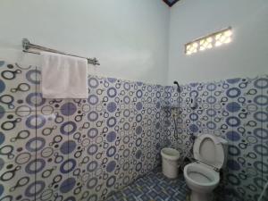 Ένα μπάνιο στο ONara Homestay