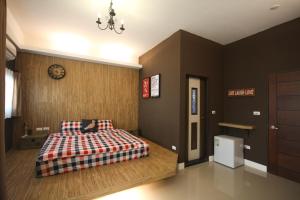 Katil atau katil-katil dalam bilik di Meet B&B