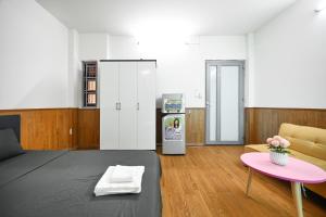 Postel nebo postele na pokoji v ubytování Cali Homestay