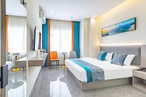 Voodi või voodid majutusasutuse Zhuhai Golden Lake Bay Hotel toas