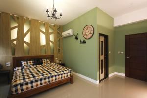 Katil atau katil-katil dalam bilik di Meet B&B