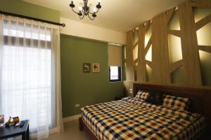 Katil atau katil-katil dalam bilik di Meet B&B