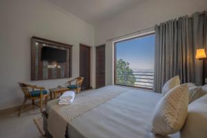Postel nebo postele na pokoji v ubytování Wonder Inn Kasauli