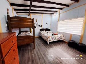 Dviaukštė lova arba lovos apgyvendinimo įstaigoje Cabaña 2 Atardecer Fandango