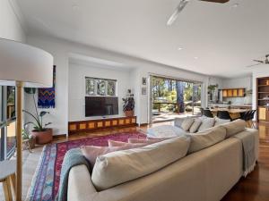 a large living room with a large couch at Nature's Doorstep - Redgate Beach NEW in Margaret River Town