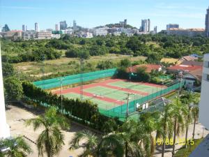 an aerial view of a tennis court in a city at Jomtien Condotel Condominium in Pattaya South