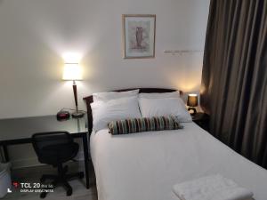 Letto o letti in una camera di Sweet House B&B