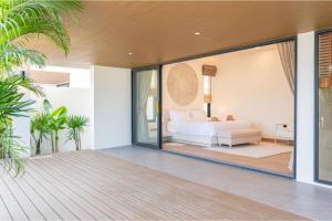 Ένα ή περισσότερα κρεβάτια σε δωμάτιο στο Modern Villa Walking Distance to Fisherman Village KBR15 +44 φωτογραφίες