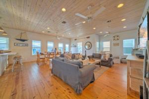 a large living room with couches and a kitchen at Best Little Shore House by AvantStay Cart Zone in Port Aransas