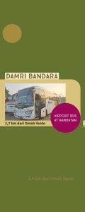 a sign for a caravan caravan bandaria with a picture of a bus at Kos Omah Yanto 19 in Jakarta