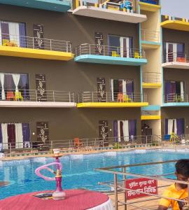 Bazén v ubytování ST Apple Beach Resort Mandarmani nebo v jeho okolí