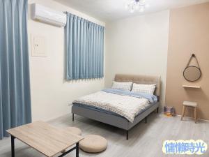 Giường trong phòng chung tại Lazy Time B&B