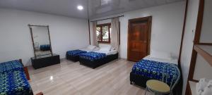 Tempat tidur dalam kamar di Finca Hotel Yerbabuena