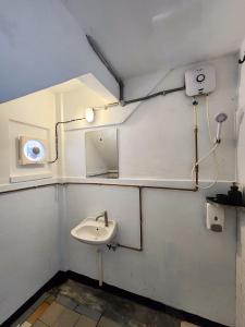 a bathroom with a sink and a mirror at Bestow Boutique Hotel in Kuala Lumpur +104 photos