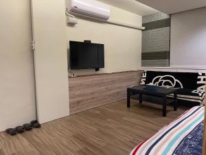 TV a/nebo společenská místnost v ubytování Star Moon Forest Inn