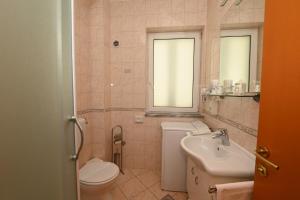 Koupelna v ubytování Apartmani Trogir