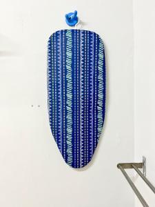 a blue computer mouse hanging on a wall at Homestay Terengganu - Stadium, Drawbridge, UMT, Dataran Shahbandar in Kampong Banggol