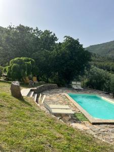 Bazén v ubytování Agriturismo Campo dei Lupi nebo v jeho okolí