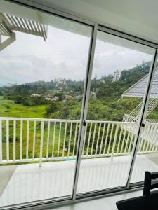 una vista desde el balcón de una casa en Casa valley peruim villa en Anachal