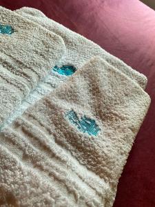 Posteľ alebo postele v izbe v ubytovaní BLU HOME TRINACRIA