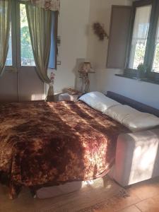 Postel nebo postele na pokoji v ubytování La casa di Giulia