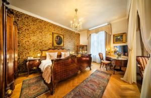 Postel nebo postele na pokoji v ubytování Esplanade Hotel Prague