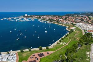 an aerial view of a harbor with boats in the water at Appartmani Punta in Umag