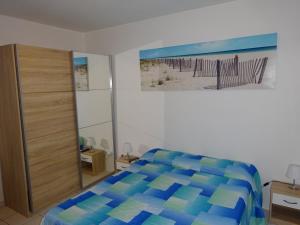 Llit o llits en una habitació de Les Créolines