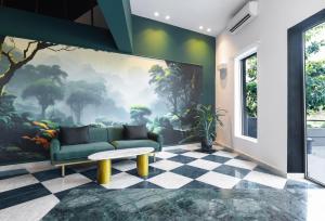 A seating area at Tree House Boutique Hotel