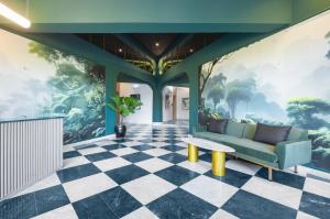 A seating area at Tree House Boutique Hotel