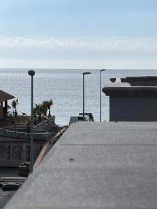 a view of the ocean from the roof of a building at Appartamento A due passi dal mare in Caulonia Marina