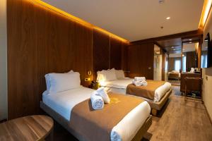 Postel nebo postele na pokoji v ubytování Kate Hotel Special Class & SPA