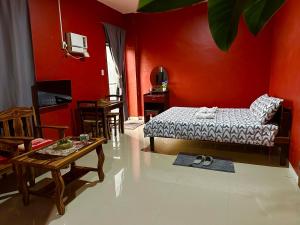 Postel nebo postele na pokoji v ubytování Rozay Travellers Inn