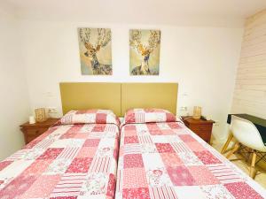 Postel nebo postele na pokoji v ubytování Hostal La Taberna