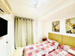Postel nebo postele na pokoji v ubytování Hostal La Taberna