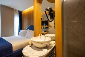 Postel nebo postele na pokoji v ubytování Kate Hotel Special Class & SPA