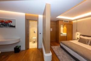 Postel nebo postele na pokoji v ubytování Baver Hotel
