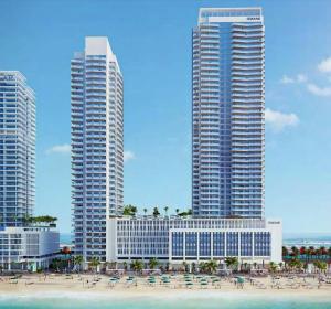 twee hoge gebouwen en een strand met stoelen en mensen bij Silkhaus palm view 1BDR with private beach in Emaar Beachfront in Dubai