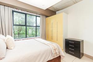 En eller flere senge i et værelse på Old House Lane Melrose Boulevard + 18 billeder