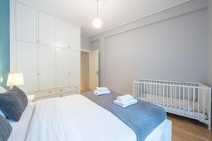 Postel nebo postele na pokoji v ubytování Pame Rentals - 2BD & 2BA Home, 4 Min to Acropolis