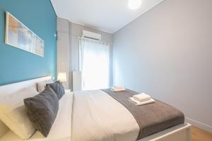Postel nebo postele na pokoji v ubytování Pame Rentals - 2BD & 2BA Home, 4 Min to Acropolis