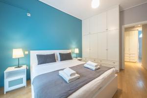 Postel nebo postele na pokoji v ubytování Pame Rentals - 2BD & 2BA Home, 4 Min to Acropolis
