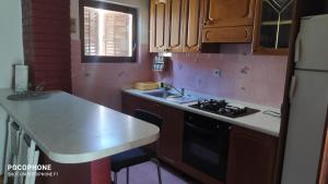 Kuchyň nebo kuchyňský kout v ubytování Apartments Tamaris