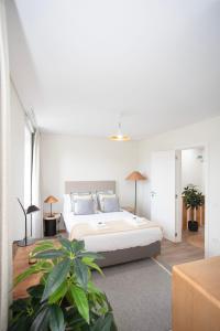 Llit o llits en una habitació de Liiiving in Porto - Downtown Quiet House