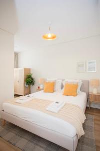 Llit o llits en una habitació de Liiiving in Porto - Downtown Quiet House