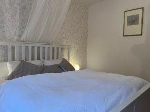 Postel nebo postele na pokoji v ubytování Haus mit Garten